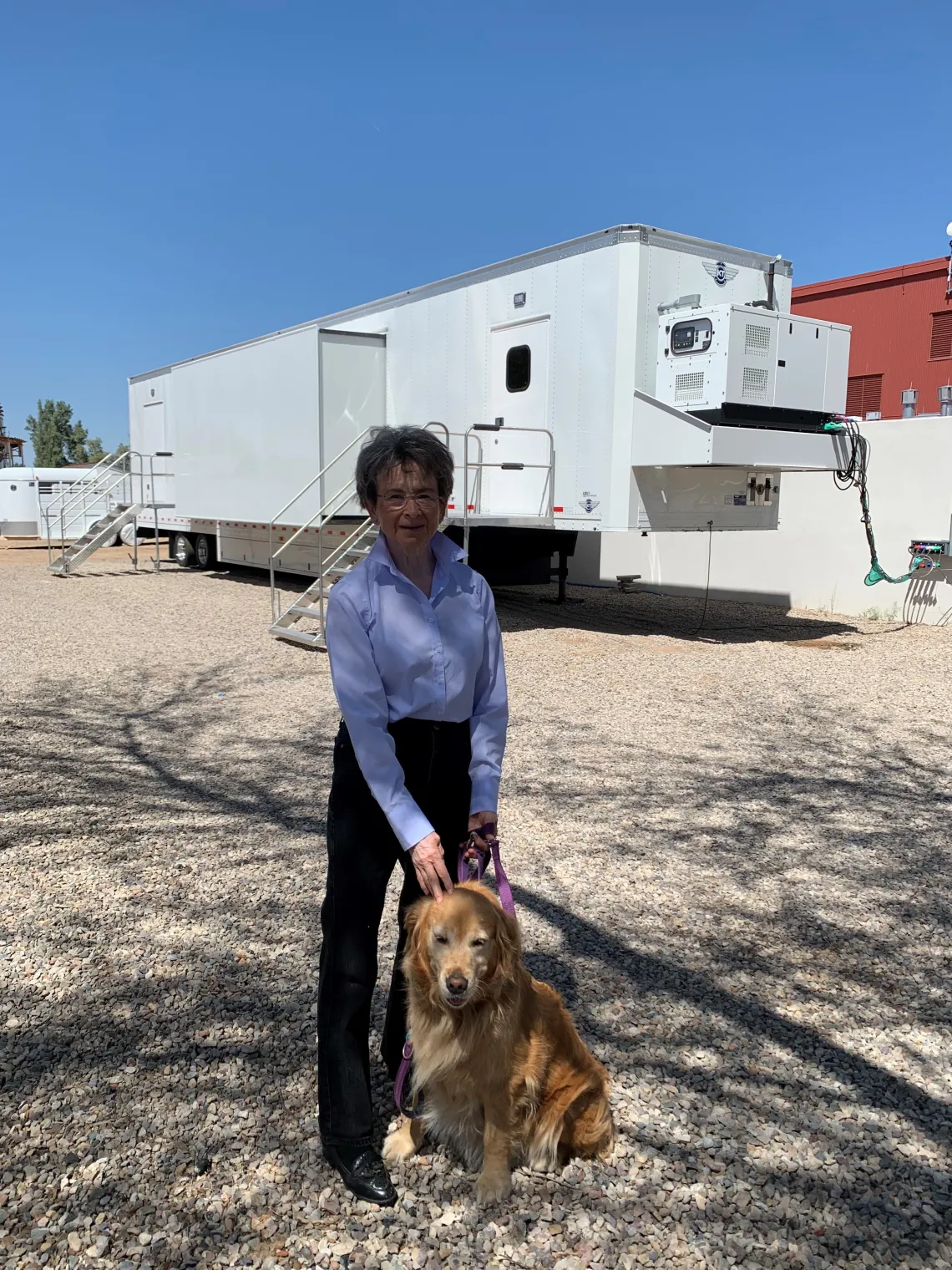 Helen Rosen and her dog Pippa, a Golden Retriever