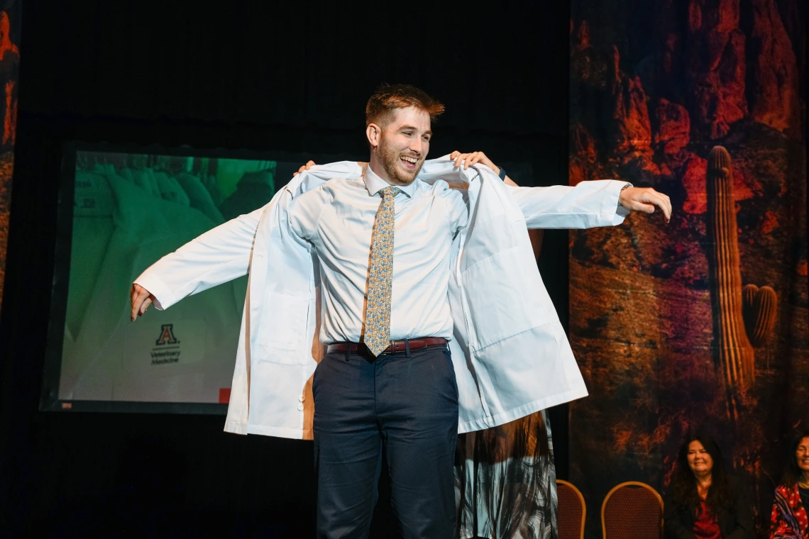 Student getting their white coat