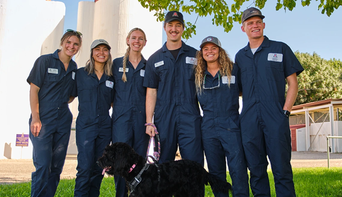Group of students posing for photo at farm