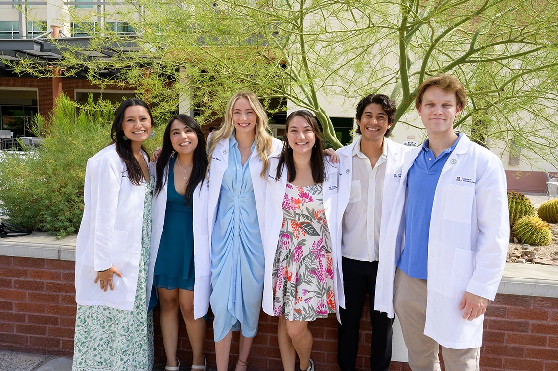students at the university of arizona college of veterinary medicine white coat event