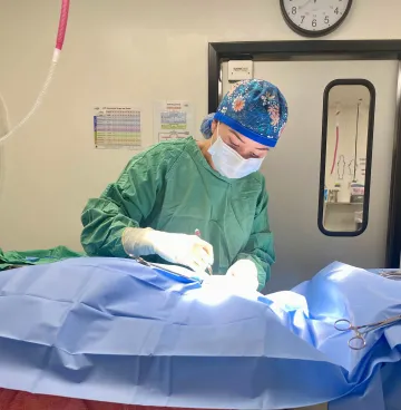 Lauren Padilla performing a surgery