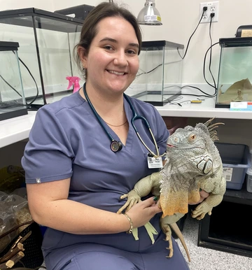 Taylor with an iguana