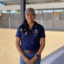 Student Santana Nez stands outdoors at Jackpot Veterinary Center.